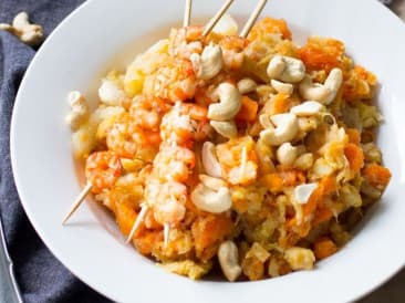 Stew with shrimp skewers