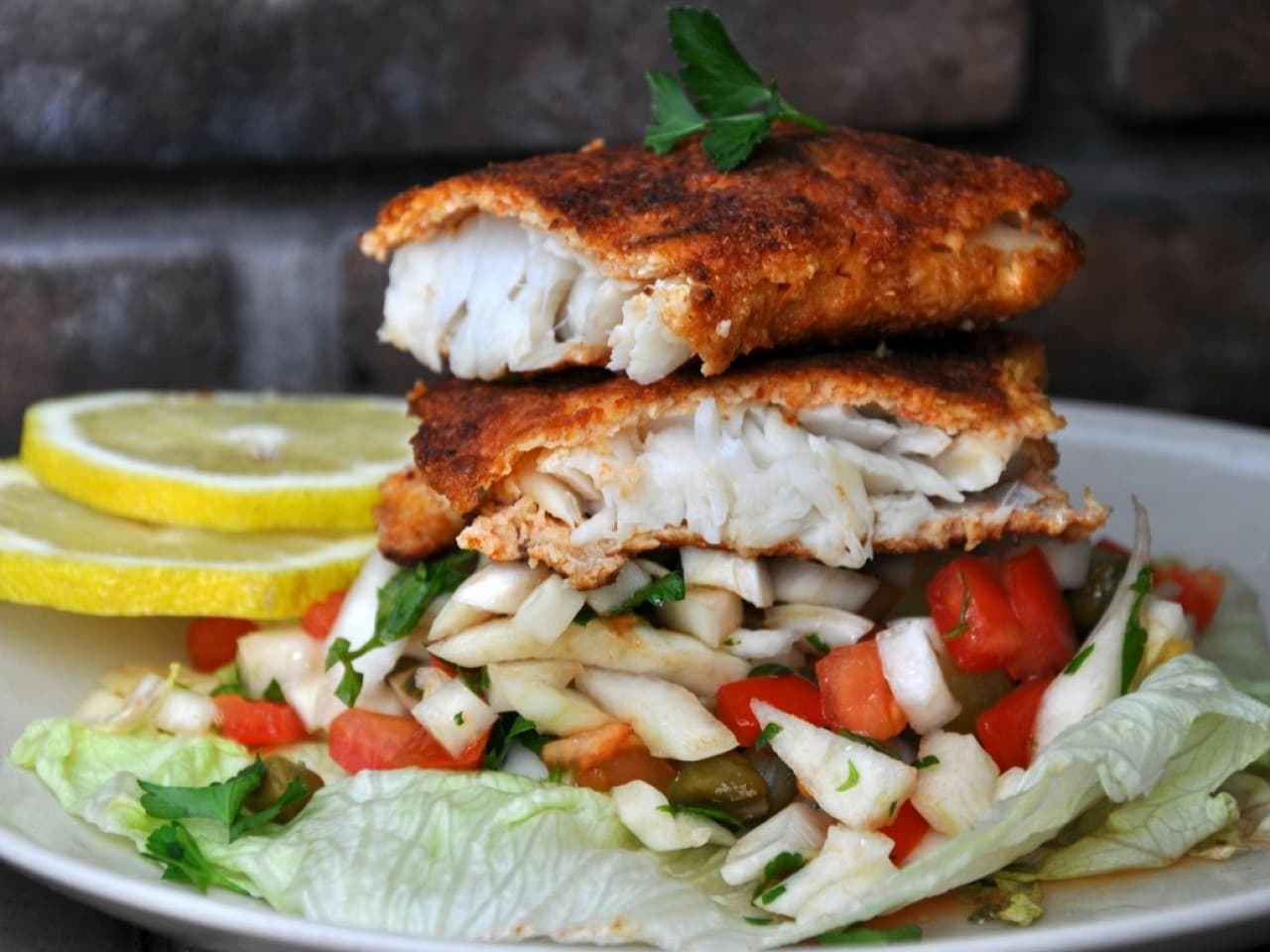 Crispy fish burger with fennel salsa
