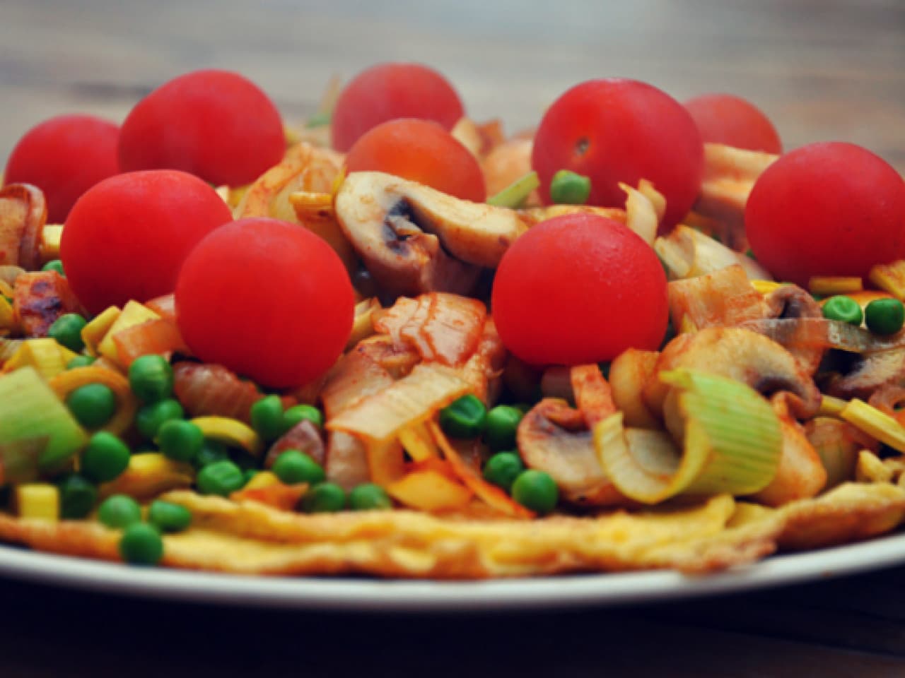 Pizzaomelet met doperwten