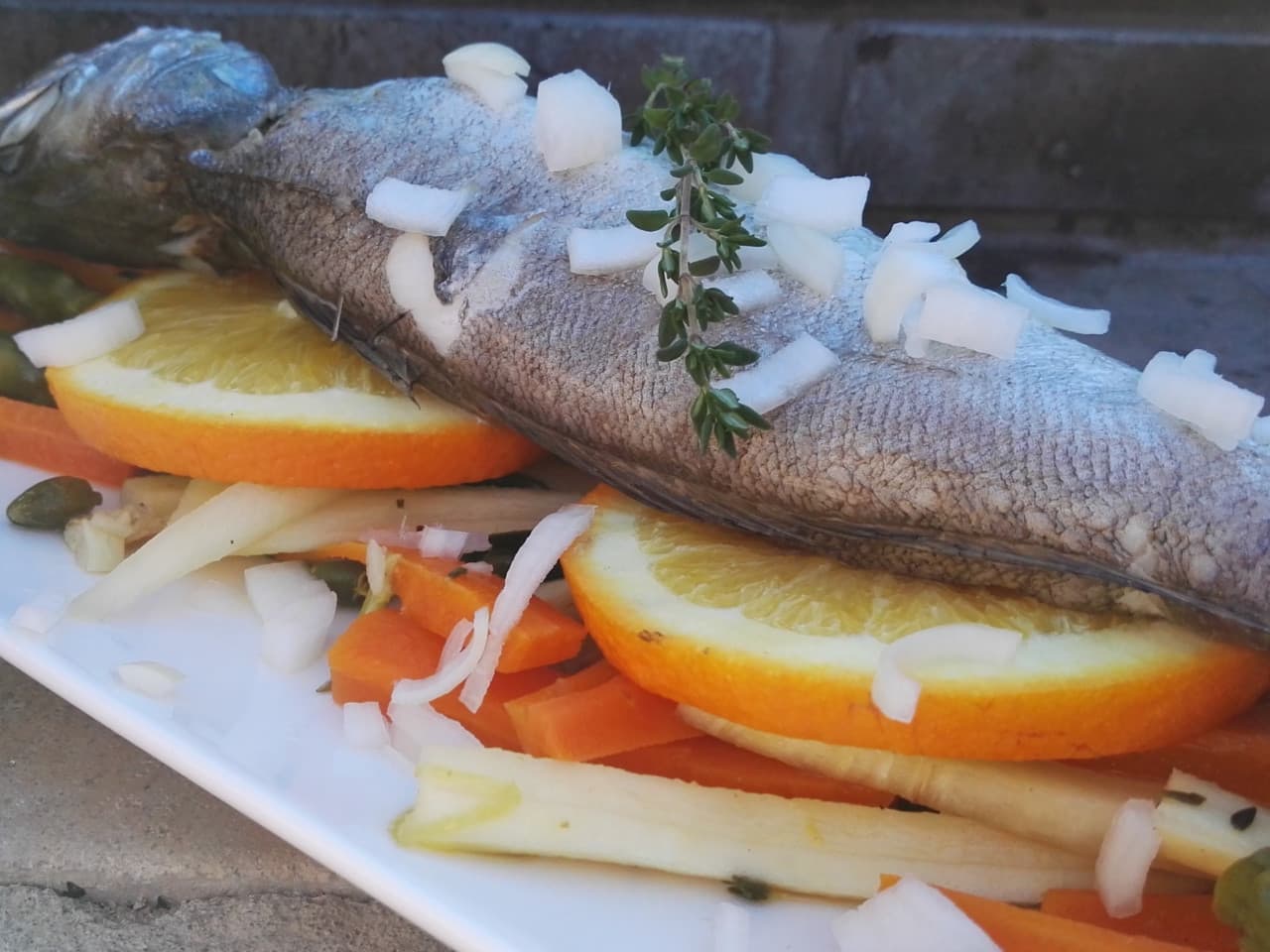 Citrus fish with winter vegetables