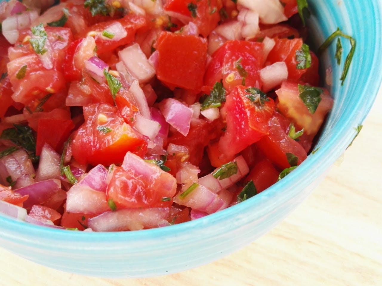 Tomato salsa with red onion