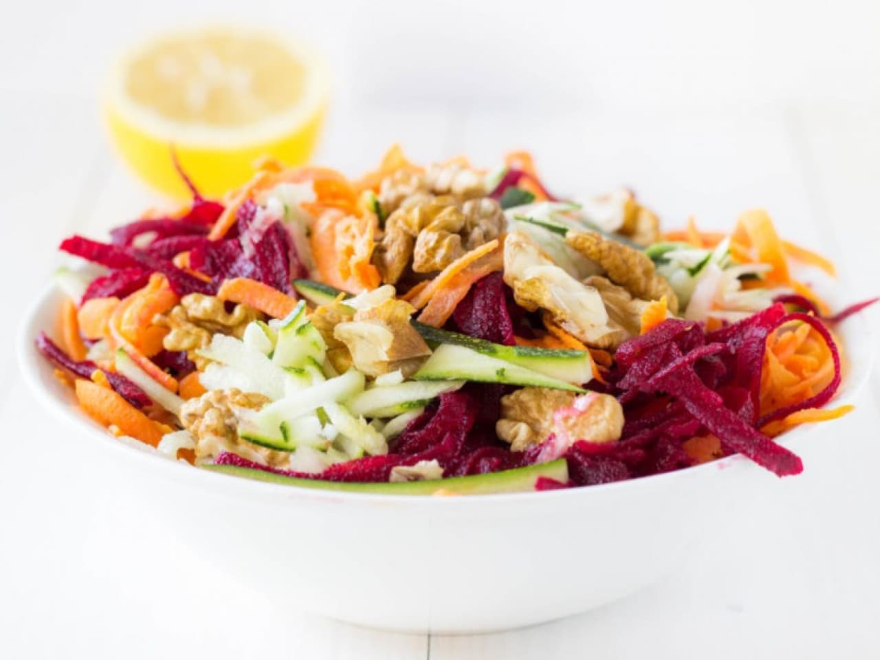 Quick raw salad with tahini dressing and lemon juice
