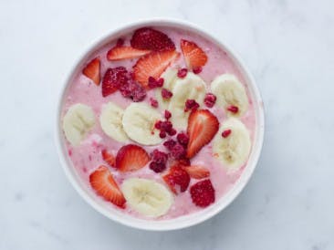 Smoothie bowl with raspberries and banana