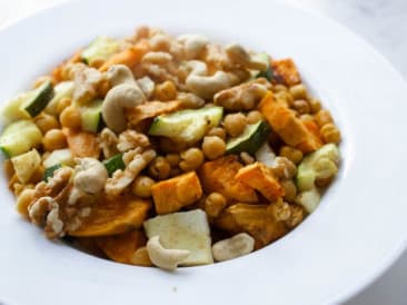 Roasted vegetable plate with nuts and cheese