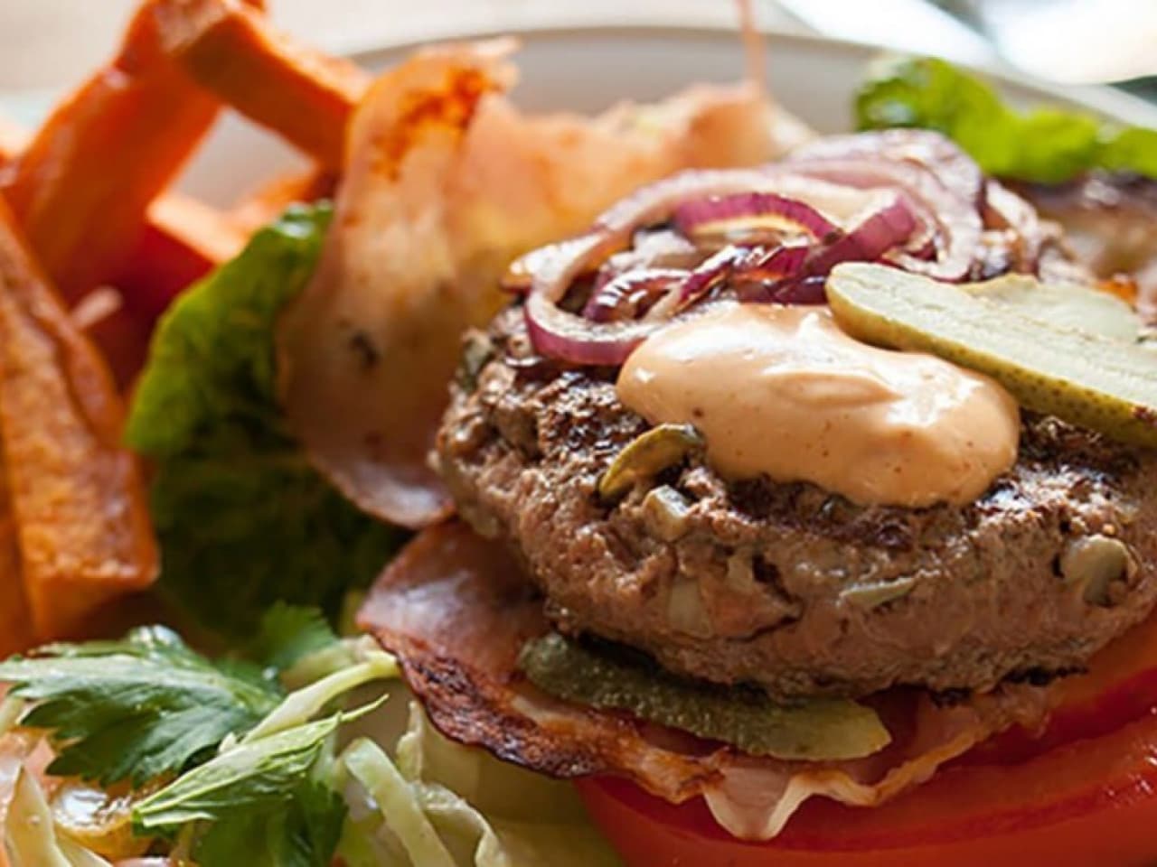 Bun-less Bacon Burger with Chili Mayo, Sweet Potato French Fries and Coleslaw