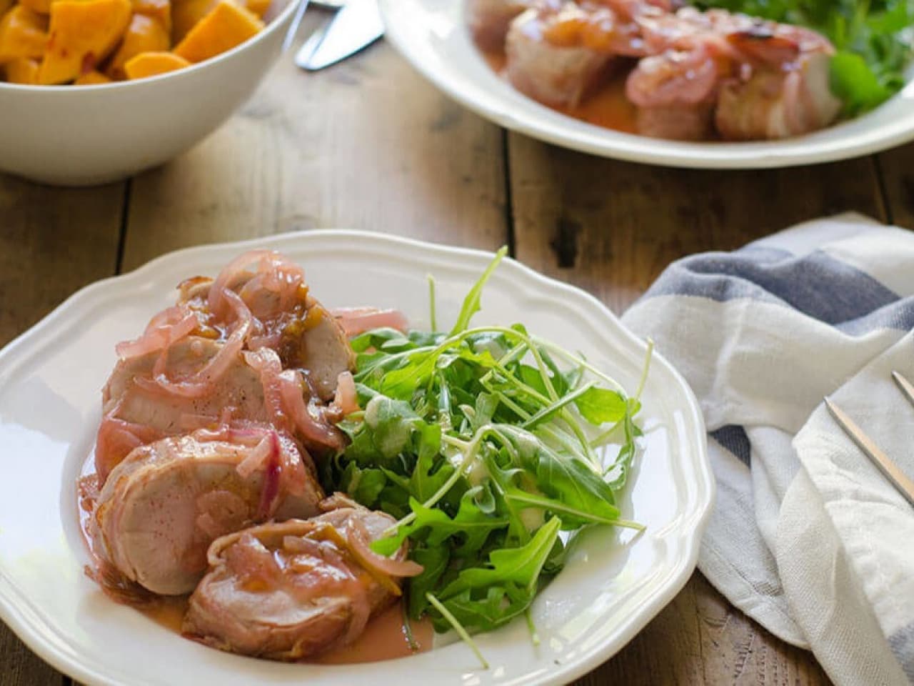 Pork tenderloin with bacon and plum sauce