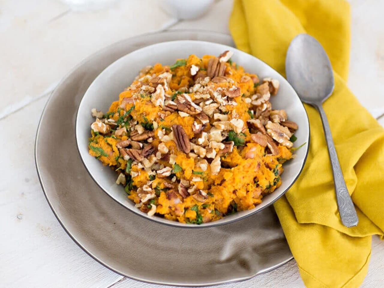 Mashed sweet potatoes with arugula