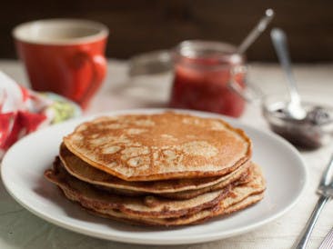 Paleo pancakes with strawberry sauce