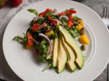 Avocado salad with strawberries and mango