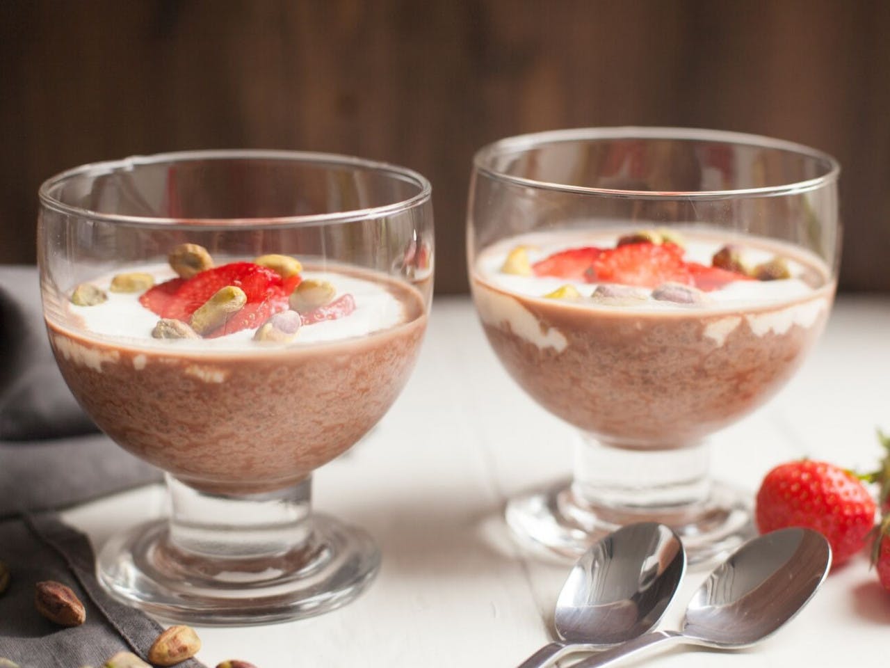 Chia pudding with chocolate, strawberries and pistachio
