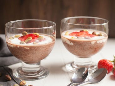 Chia pudding with chocolate, strawberries and pistachio