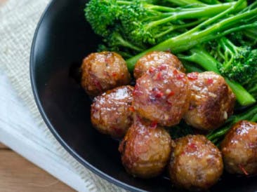 Sweet and sour chicken turkey meatballs with broccolini