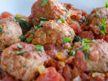 Lamb meatballs in a tomato sauce with mint