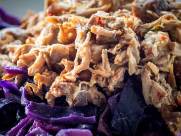 Spicy pulled pork with red cabbage.