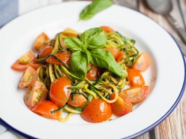 Zoodles with pesto and cherry tomatoes