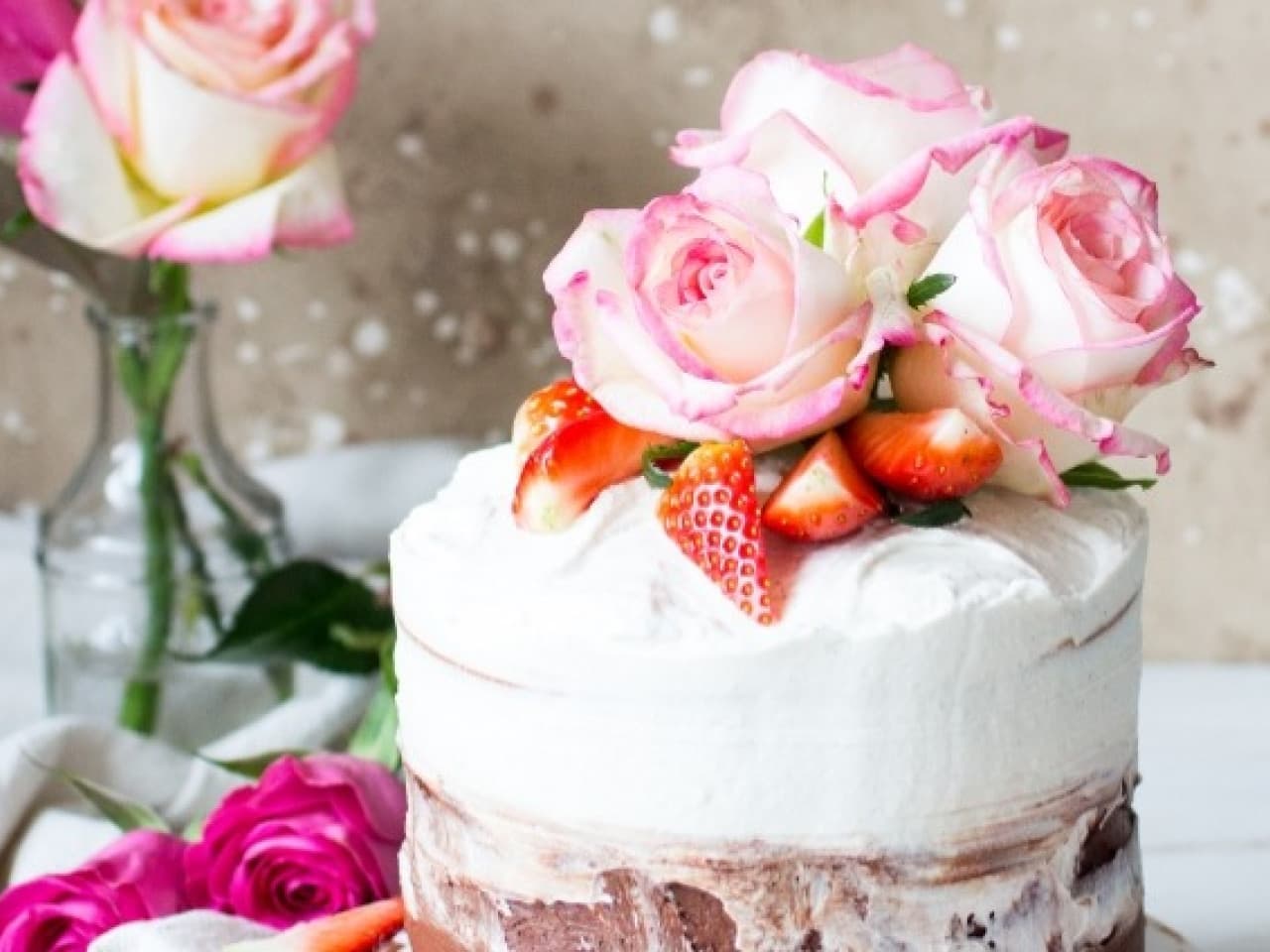 Ombre cake with chocolate, vanilla and raspberries