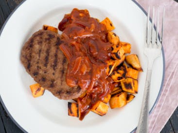 Burgers with onion sauce and baked sweet potato