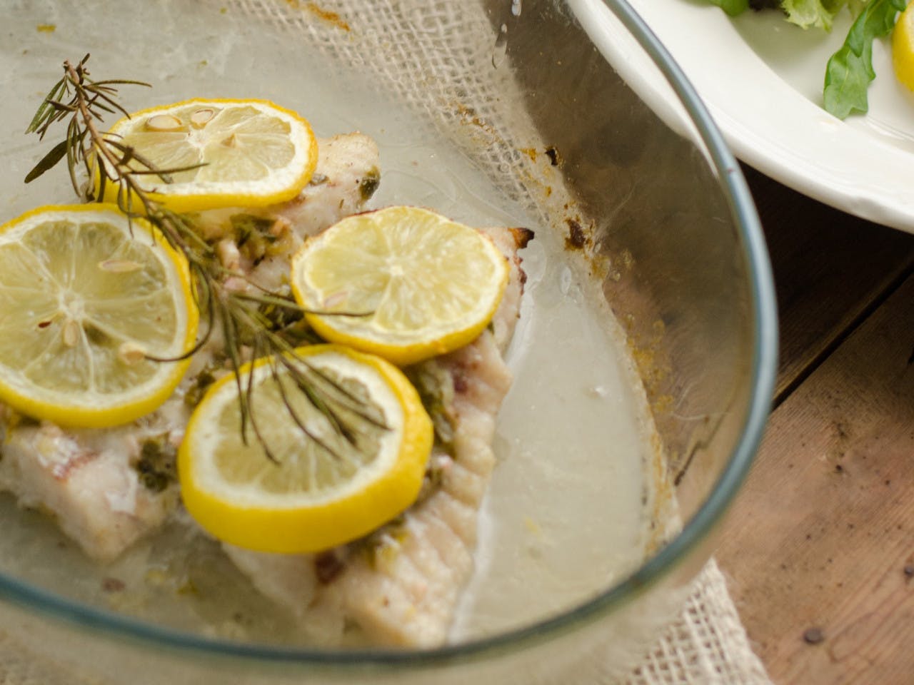 Oven baked cod with lemon and rosemary