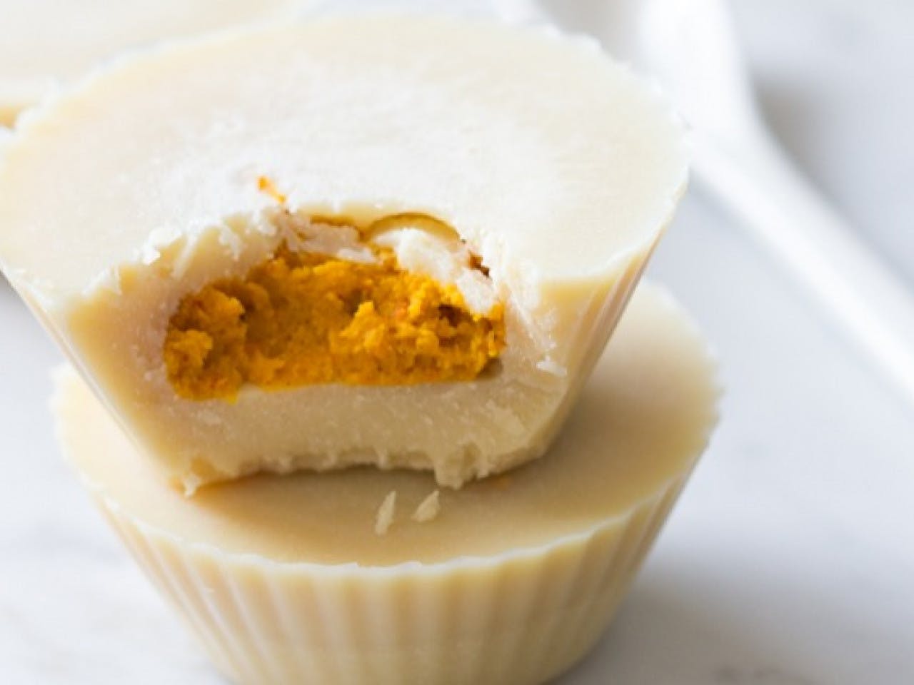 White chocolate cups with pumpkin filling