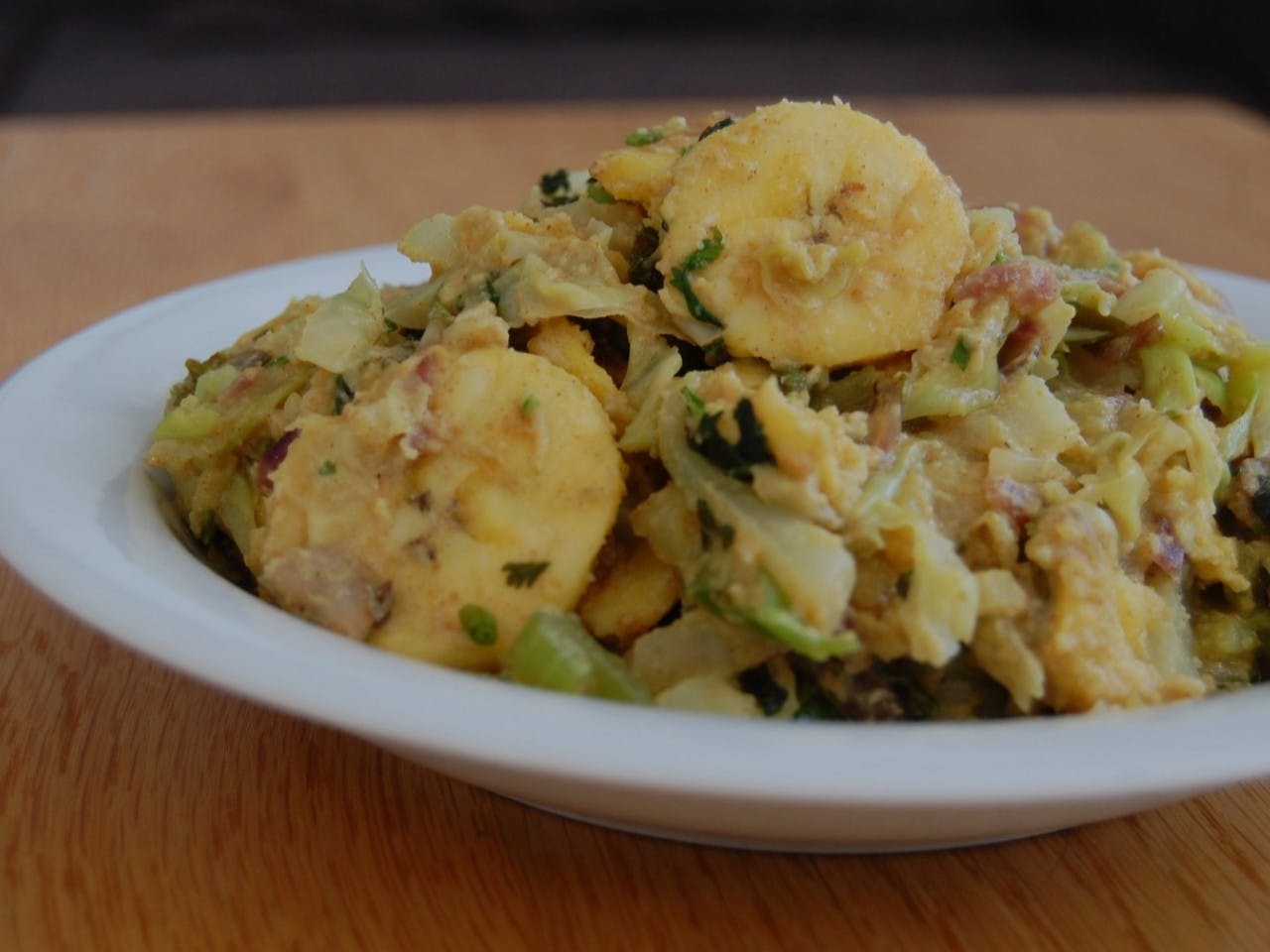 Pointed cabbage curry with plantain