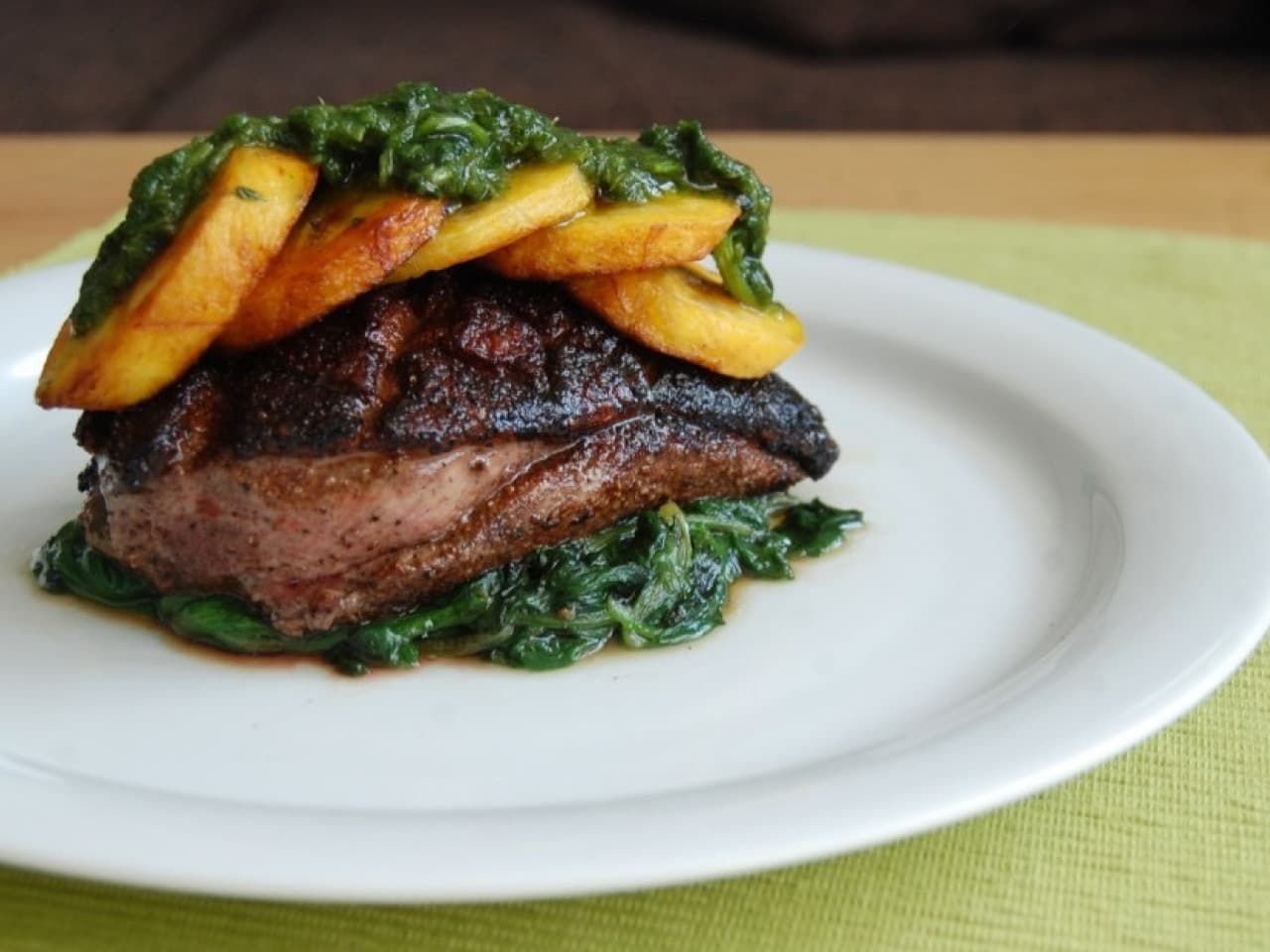 Spicy duck breast with plantain and coriander-mint sauce