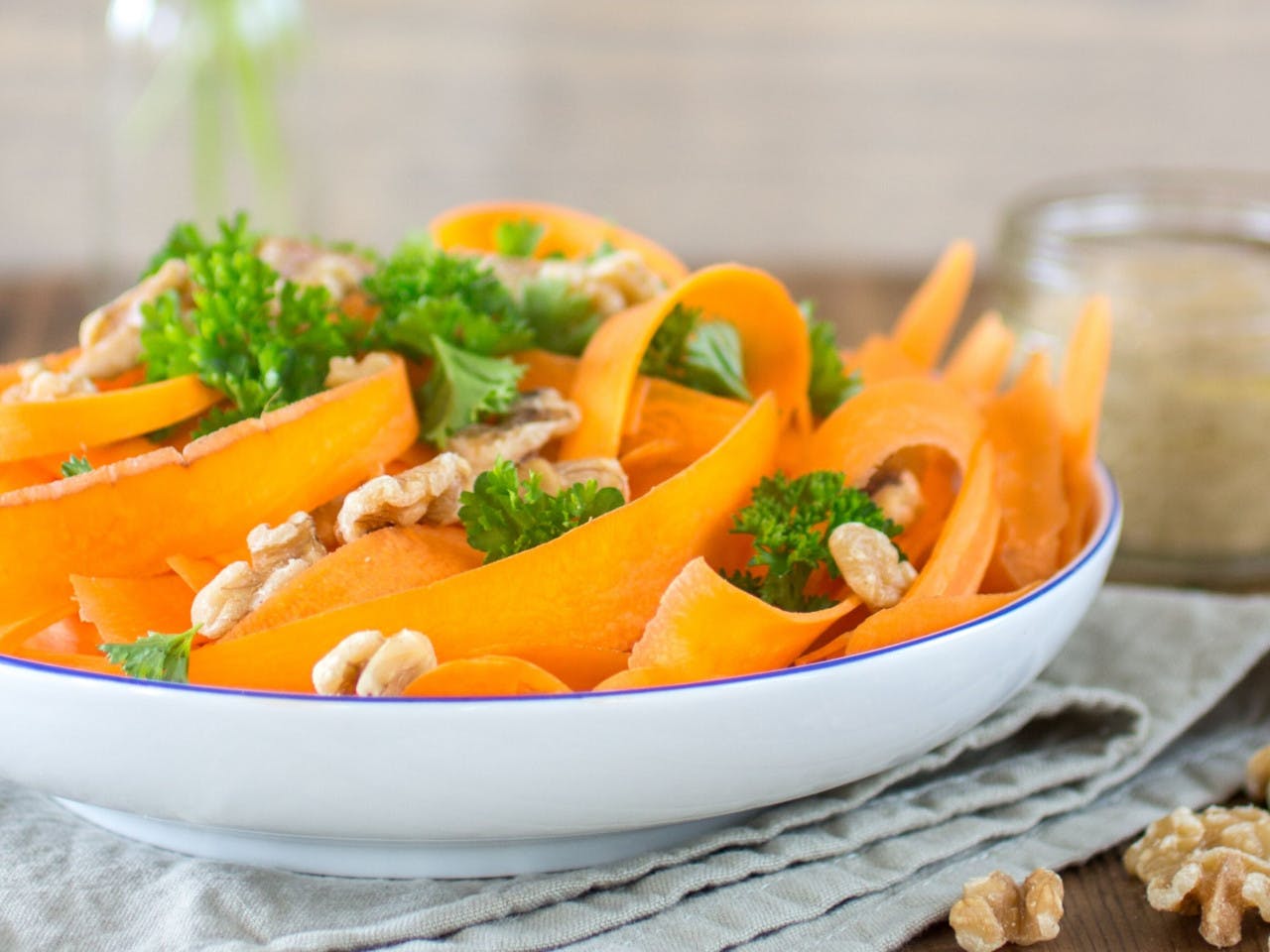 Carrot ribbons with sesame and herb dressing