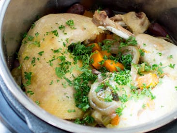 Stewed chicken legs with olives