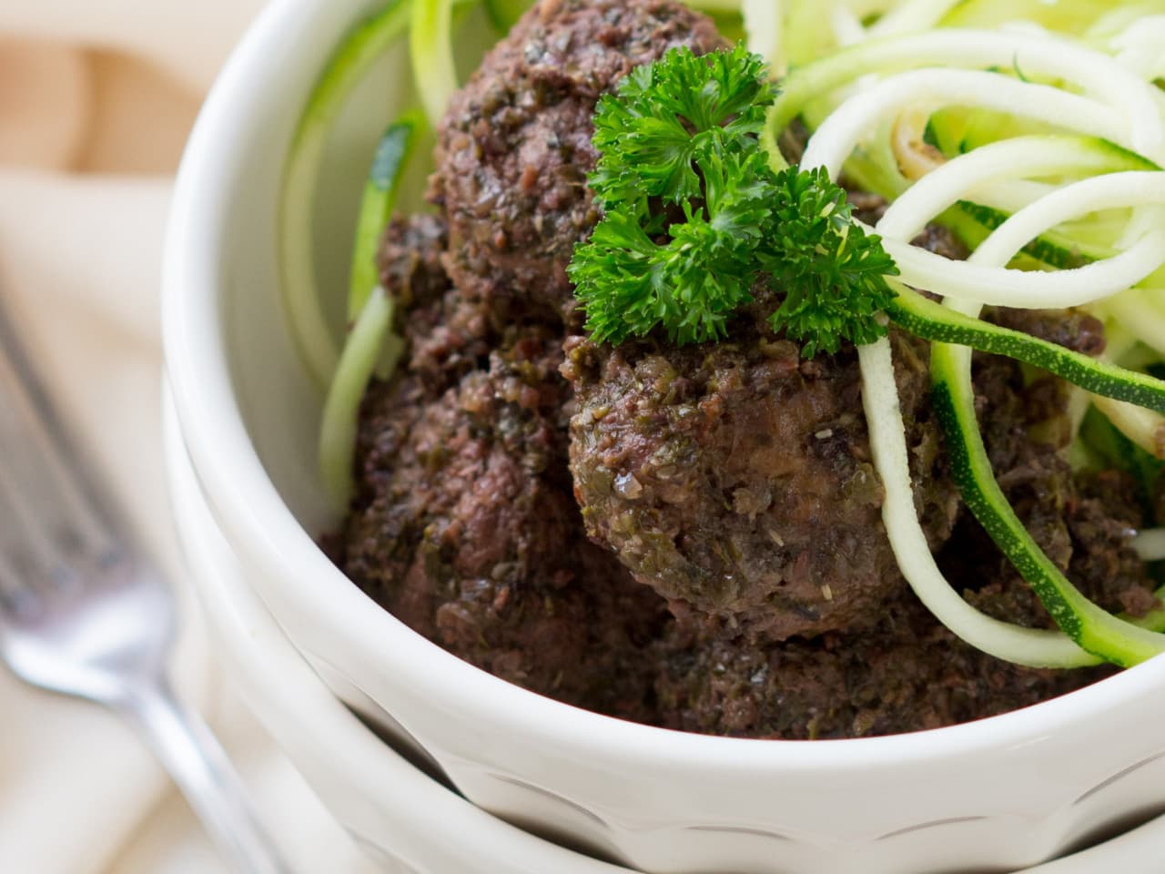 Meatballs in pesto sauce