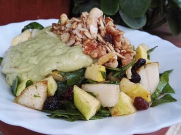 Fruit salad with banana avocado sauce & granola