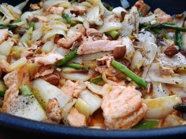 Salmon dish with chicory and green asparagus