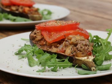 Stuffed eggplant with minced meat and tomato