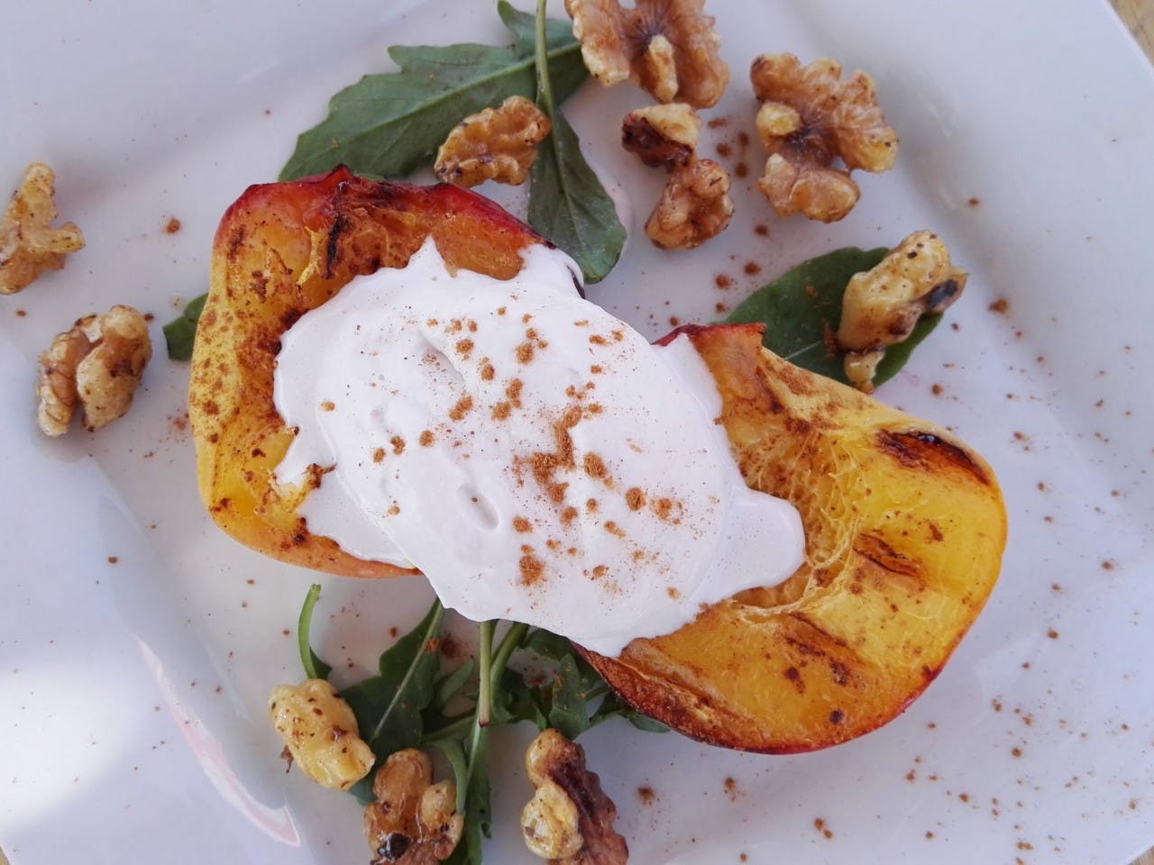 Grilled peach with coconut cream