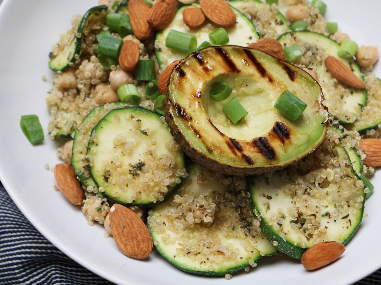 Spicy quinoa with grilled avocado