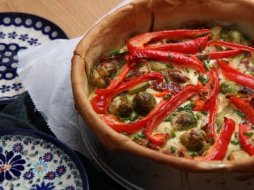 Savory pie with mackerel and green salad