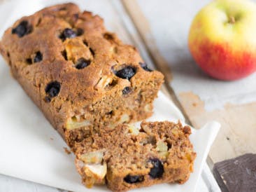 Vegan apple cake with berries and walnuts