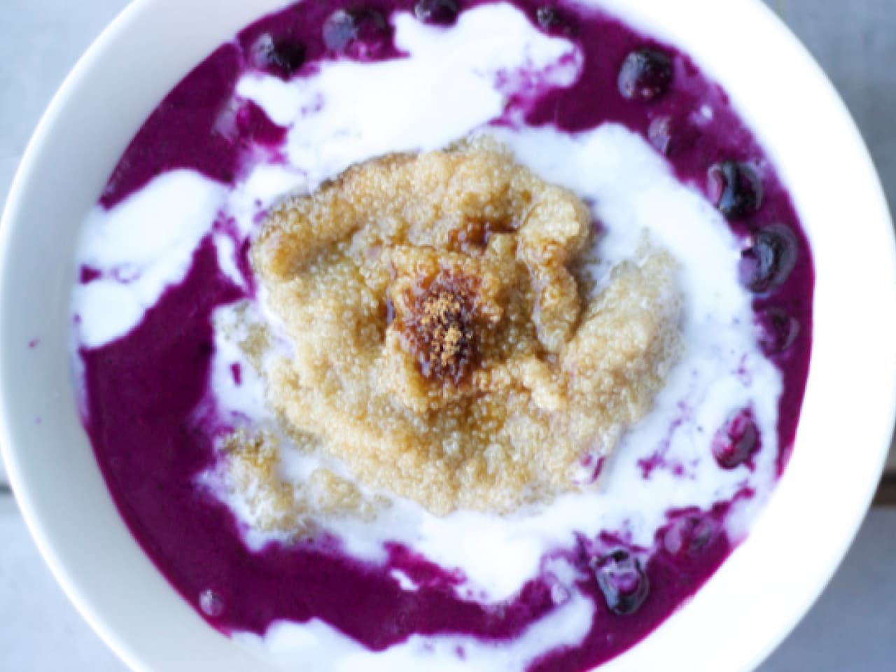 Amaranth porridge with coconut & blueberry sauce