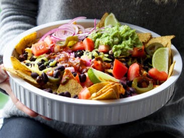 Vegan nacho casserole with cheese and beans
