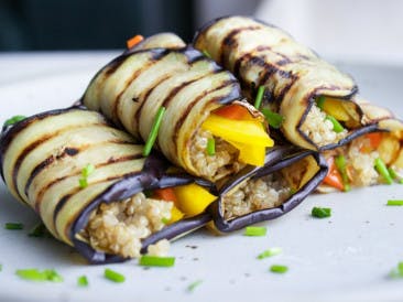 Grilled aubergine rolls with quinoa and chives