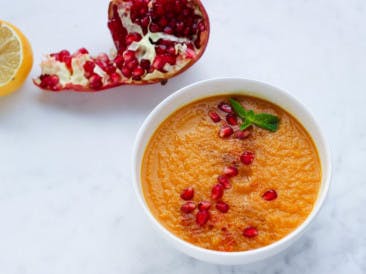 Carrot soup with ginger and pomegranate